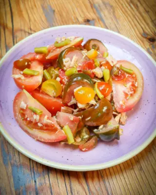 Heritage tomatoes, bonito tuna, spicy guindillas, dressed with Spanish extra-virgin olive oil. Simplicty itself. Perfect.