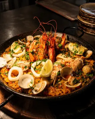 We’re assuming the weather is going to be like the Costa del Sol and our Head Chef Alex is going to be making a huge paella on the terrace between 2.00 – 3.30pm this Sunday to celebrate our 10th anniversary. 

We will be able to feed around 60 guests on a first-come-first -served basis, so do come and join us for a complementary bowl of "Paella Mixta" as a thank you from us for a fantastic 10 years. Salud! 

#laferia #spanishtapas #harrogaterestaurants