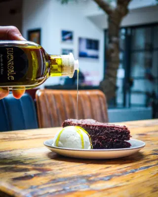 Another favourite La Feria dessert, available this 10th anniversary week. 

An indulgent olive oil cake served with a scoop of ice cream, finished with a drizzle of Fuenroble virgin olive oil. 

#laferia #spanishtapas #harrogaterestaurants