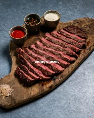 Come closer.

28-day-aged centre-cut rump steak, served with mojo picón, chimichurri and Picos blue cheese sauces.

450g and made for sharing around the table. Our steak is supplied by Sykes House Farm. 

#laferia #spanishtapas #harrogaterestaurants