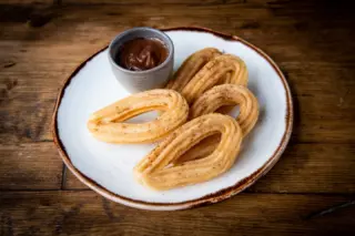 Churros dusted in cinammon sugar, served with our own homemade chocolate sauce are far and away the most popular dessert at La Feria. 

For sharing, or not. 

#laferia #spanishtapas #harrogaterestaurants